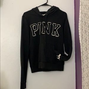 Pink black hoodie.